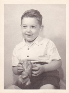 Peter as toddler with toy.jpg